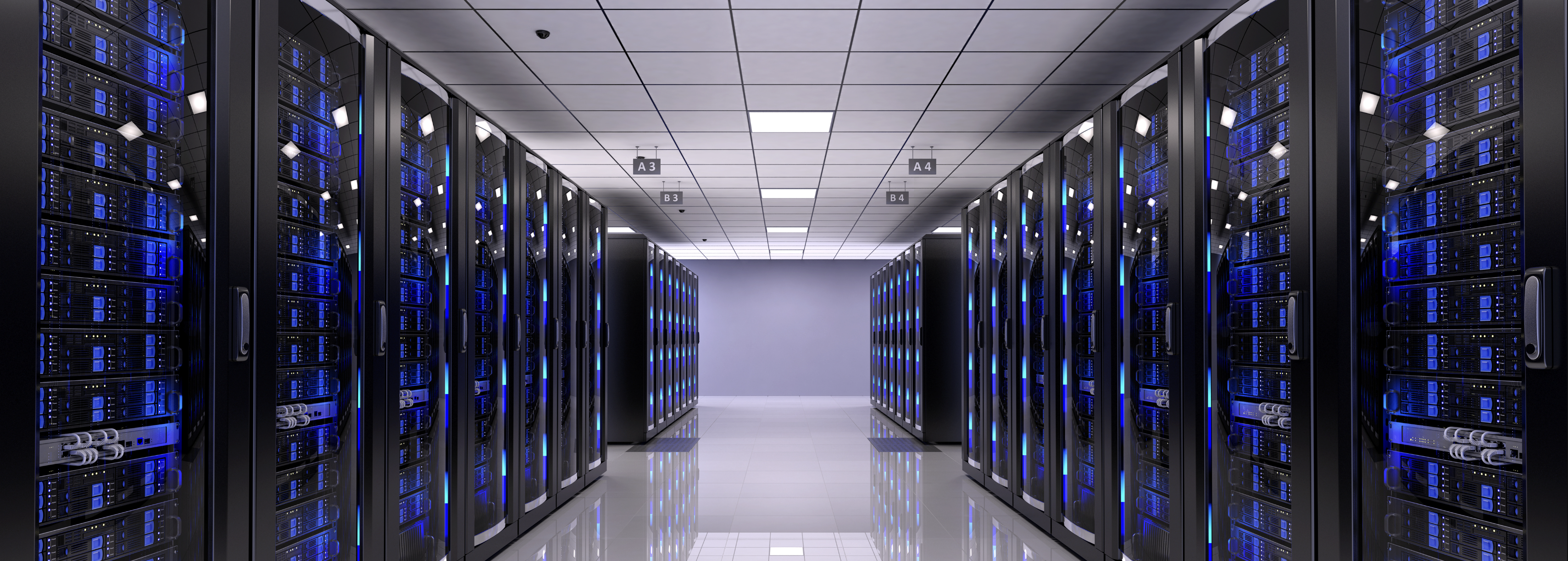 White server room with black racks and flashing blue lights